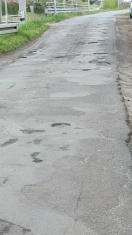 Foto: Lochfraß auf der Straße  