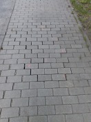Foto: Gehweg beschädigt Unfallgefahr 