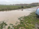 Foto: Regen überflutet Strasse 