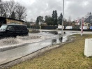 Foto: Überflutete Einfahrt zur Straße an der Heidekrautbahn  