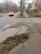 Foto: Straßenecke kaputt 