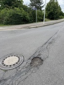 Foto: Schlagloch/ Schaden am Asphallt 