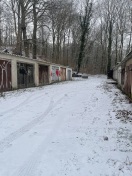 Foto: Autowrack bei den Garagen  